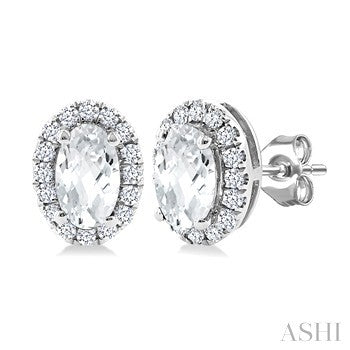 5X3 MM Oval Shape White Topaz and 1/8 Ctw Round Cut Diamond Halo Semi-Precious Stud Earrings in 10K White Gold