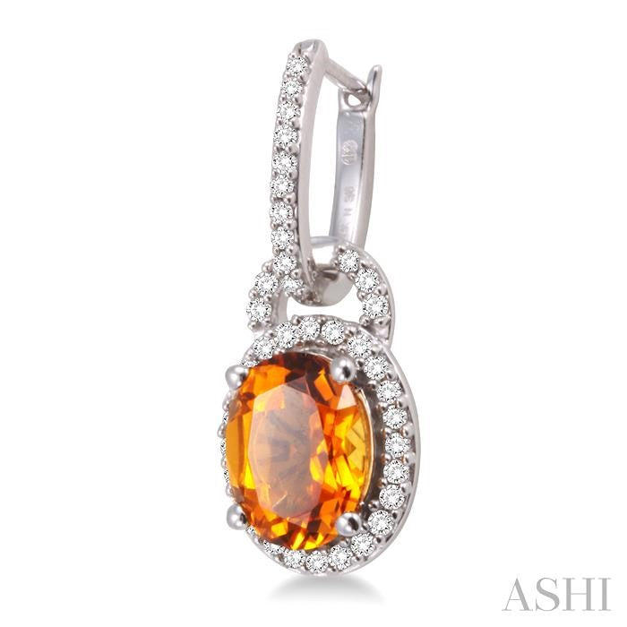9X7 MM Oval Cut Citrine and 3/8 Ctw Round Cut Diamond Earrings in 14K White Gold