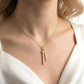 1/6 Ctw Twin Vertical Bar Round Cut Diamond Fashion Pendant With Chain in 14K Yellow Gold