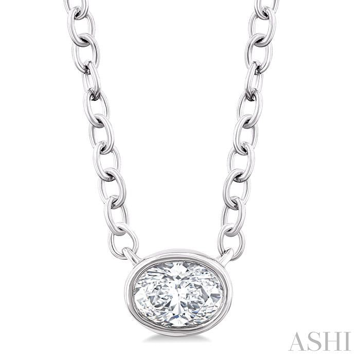 1/6 Ctw Petite East-West Bezel Set Oval Cut Diamond Fashion Pendant With Chain in 10K White Gold