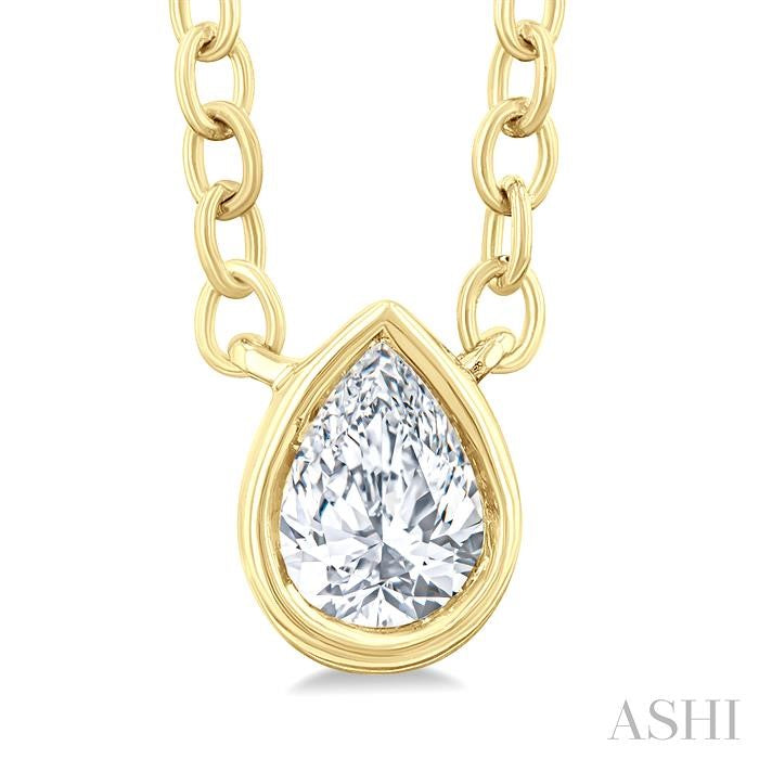 1/6 Ctw Petite Bezel Set Pear Cut Diamond Fashion Pendant With Chain in 10K Yellow Gold