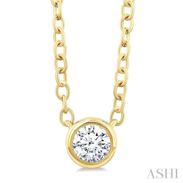 1/6 Ctw Petite Bezel Set Round Cut Diamond Fashion Pendant With Chain in 10K Yellow Gold