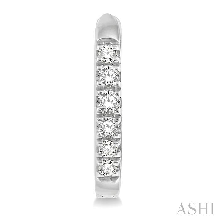 1/8 Ctw Round Cut Diamond Huggie Petite Earrings in 14K White Gold