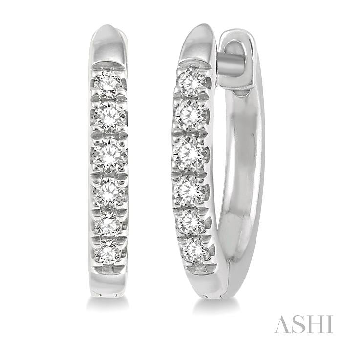 1/8 Ctw Round Cut Diamond Huggie Petite Earrings in 10K White Gold