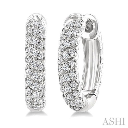 1/5 Ctw Petite Swirl Pattern Round Cut Diamond Fashion Huggies in 10K White Gold