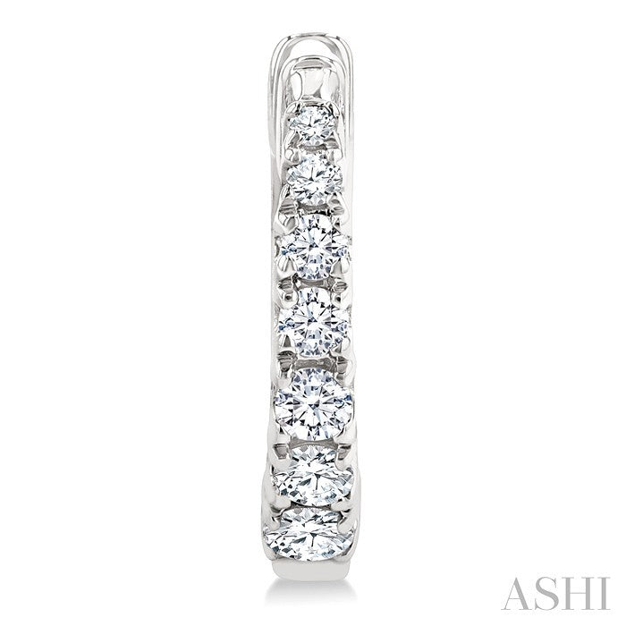 1/4 Ctw Graduated Round Cut Diamond Fashion Huggie Petites in 10K White Gold