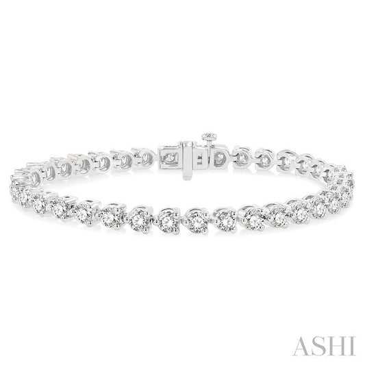 7 Ctw Round Cut Diamond 3-Prong Tennis Bracelet in 14K White Gold