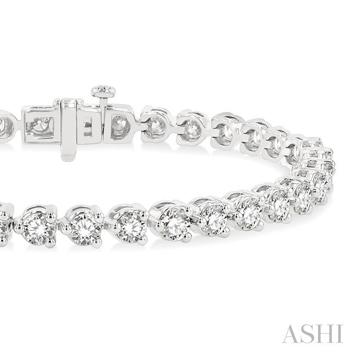 7 Ctw Round Cut Diamond 3-Prong Tennis Bracelet in 14K White Gold