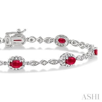 5X3 MM Oval Cut Ruby and 1/20 Ctw Round Cut Diamond Bracelet in 14K White Gold