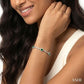 5X3 MM Oval Cut Emerald and 1/20 Ctw Round Cut Diamond Bracelet in 10K White Gold