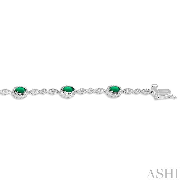 5X3 MM Oval Cut Emerald and 1/20 Ctw Round Cut Diamond Bracelet in 10K White Gold