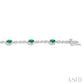 5X3 MM Oval Cut Emerald and 1/20 Ctw Round Cut Diamond Bracelet in 10K White Gold