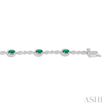 5X3 MM Oval Cut Emerald and 1/20 Ctw Round Cut Diamond Bracelet in 10K White Gold