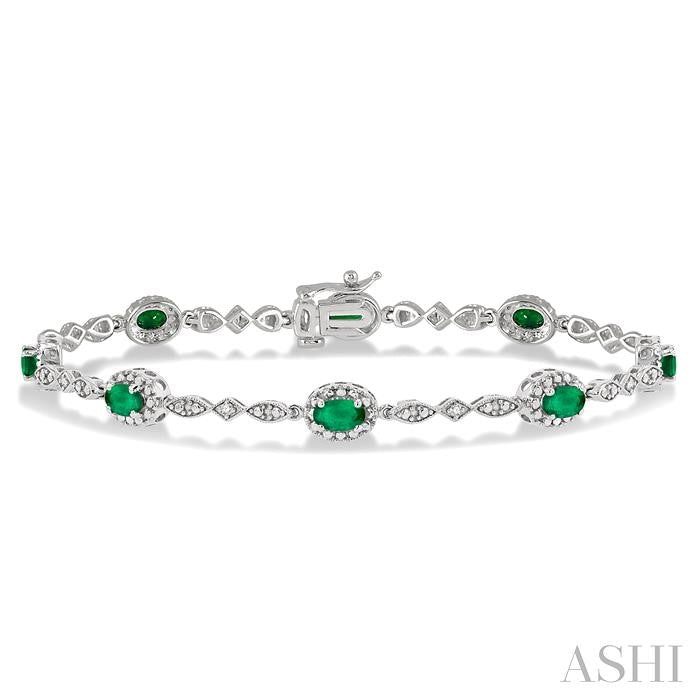 5X3 MM Oval Cut Emerald and 1/20 Ctw Round Cut Diamond Bracelet in 10K White Gold