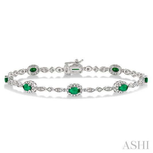 5X3 MM Oval Cut Emerald and 1/20 Ctw Round Cut Diamond Bracelet in 10K White Gold