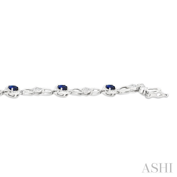 1/20 Ctw Oval Cut 4X3 MM Sapphire and Round Cut Diamond Precious Fashion Bracelet in 10K White Gold