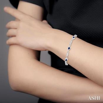 1/20 Ctw Oval Cut 4X3 MM Sapphire and Round Cut Diamond Precious Fashion Bracelet in 10K White Gold