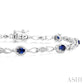 1/20 Ctw Oval Cut 4X3 MM Sapphire and Round Cut Diamond Precious Fashion Bracelet in 10K White Gold