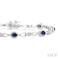 1/20 Ctw Oval Cut 4X3 MM Sapphire and Round Cut Diamond Precious Fashion Bracelet in 10K White Gold