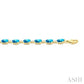 6X4 MM Oval Cut Blue Topaz and 1/6 Ctw Round Cut Diamond Semi-Precious Tennis Bracelet in 10K Yellow Gold