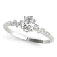 Scattered Diamond Oval Engagement Ring