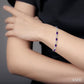 7X5 MM Oval Cut Amethyst and 1/10 Ctw Round Cut Diamond Semi-Precious Infinity Bracelet in Sterling Silver