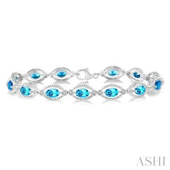 6X4 MM Oval Cut Blue Topaz and 1/10 Ctw Round Cut Diamond Semi-Precious Bracelet in Sterling Silver