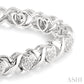 1/10 Ctw 'X' and Heart Shape Round Cut Diamond Bracelet in Sterling Silver