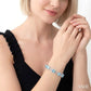 7X7 MM Cushion Shape Blue Topaz and 1/20 Ctw Round Cut Diamond Fashion Bracelet in Sterling Silver