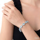 7X7 MM Cushion Shape Blue Topaz and 1/20 Ctw Round Cut Diamond Fashion Bracelet in Sterling Silver