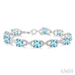 7X7 MM Cushion Shape Blue Topaz and 1/20 Ctw Round Cut Diamond Fashion Bracelet in Sterling Silver