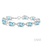 7X7 MM Cushion Shape Blue Topaz and 1/20 Ctw Round Cut Diamond Fashion Bracelet in Sterling Silver