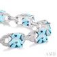 7X7 MM Cushion Shape Blue Topaz and 1/20 Ctw Round Cut Diamond Fashion Bracelet in Sterling Silver