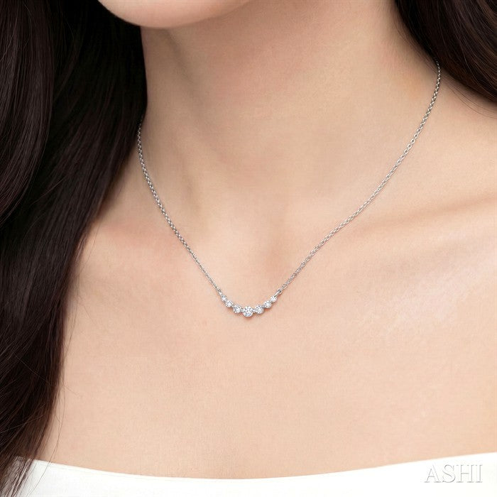 1/8 Ctw Petite Smile Graduated Round Cut Diamond Necklace in Sterling Silver