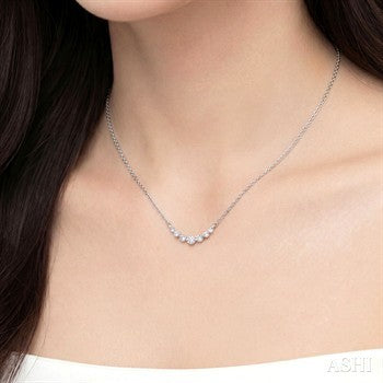 1/8 Ctw Petite Smile Graduated Round Cut Diamond Necklace in Sterling Silver