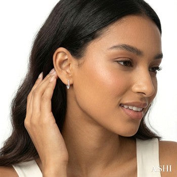 1/6 Ctw Petite Shared Prong Round Cut Diamond Hoop Earrings in Sterling Silver
