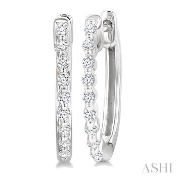 1/6 Ctw Petite Shared Prong Round Cut Diamond Hoop Earrings in Sterling Silver