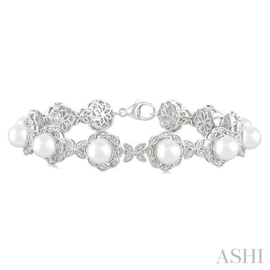 6 MM Cultured Pearl and 1/6 Ctw Round Cut Diamond Bracelet in Sterling Silver