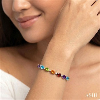 7X5 MM Oval Shape Rainbow and 1/10 Ctw Round Cut Diamond Semi-Precious Bracelet in Sterling Silver