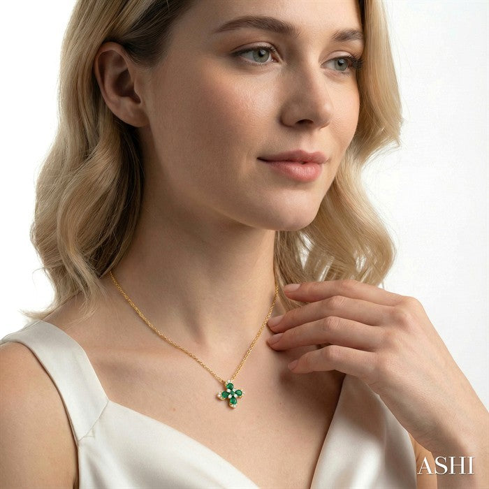 4X3 MM Pear and 2 MM Round Emerald and 1/6 Ctw Round Cut Diamond Floral Blossom Precious Pendant With Chain in 14K Yello
