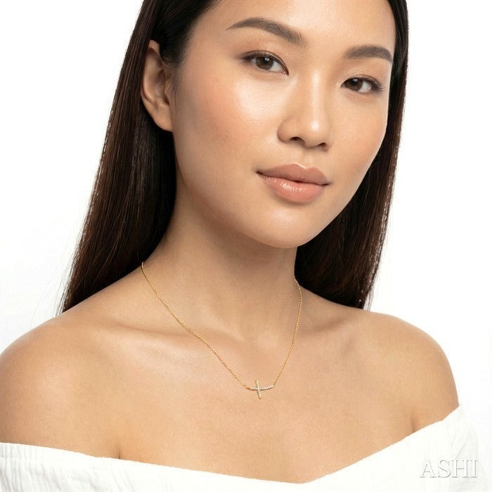 1/10 Ctw Petite Sideways Cross Round Cut Diamond Fashion Pendant With Chain in 10K Yellow Gold