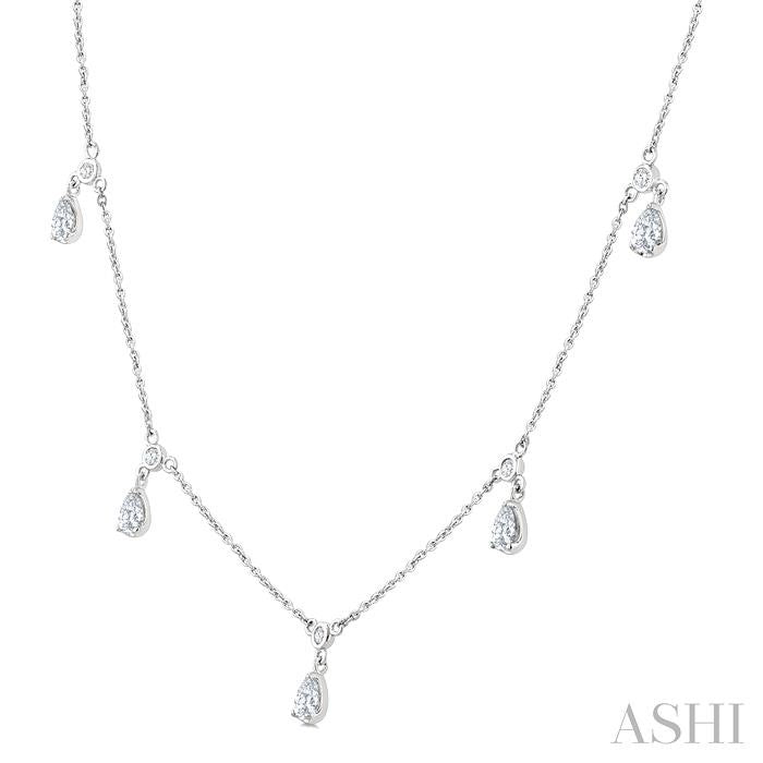 5/8 Ctw Dangle Pear and Round Cut Diamond Station Necklace in 14K White Gold