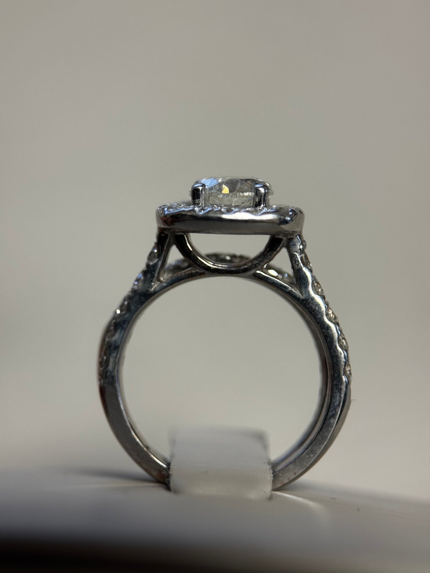 14K white gold halo wedding set with 1ct round diamond. Brilliant halo & matching band for timeless sparkle and elegance