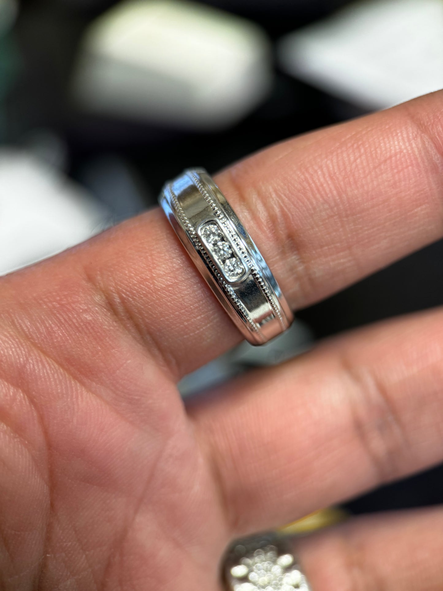 10k white gold milgrain 3-stone band 1/10ctw