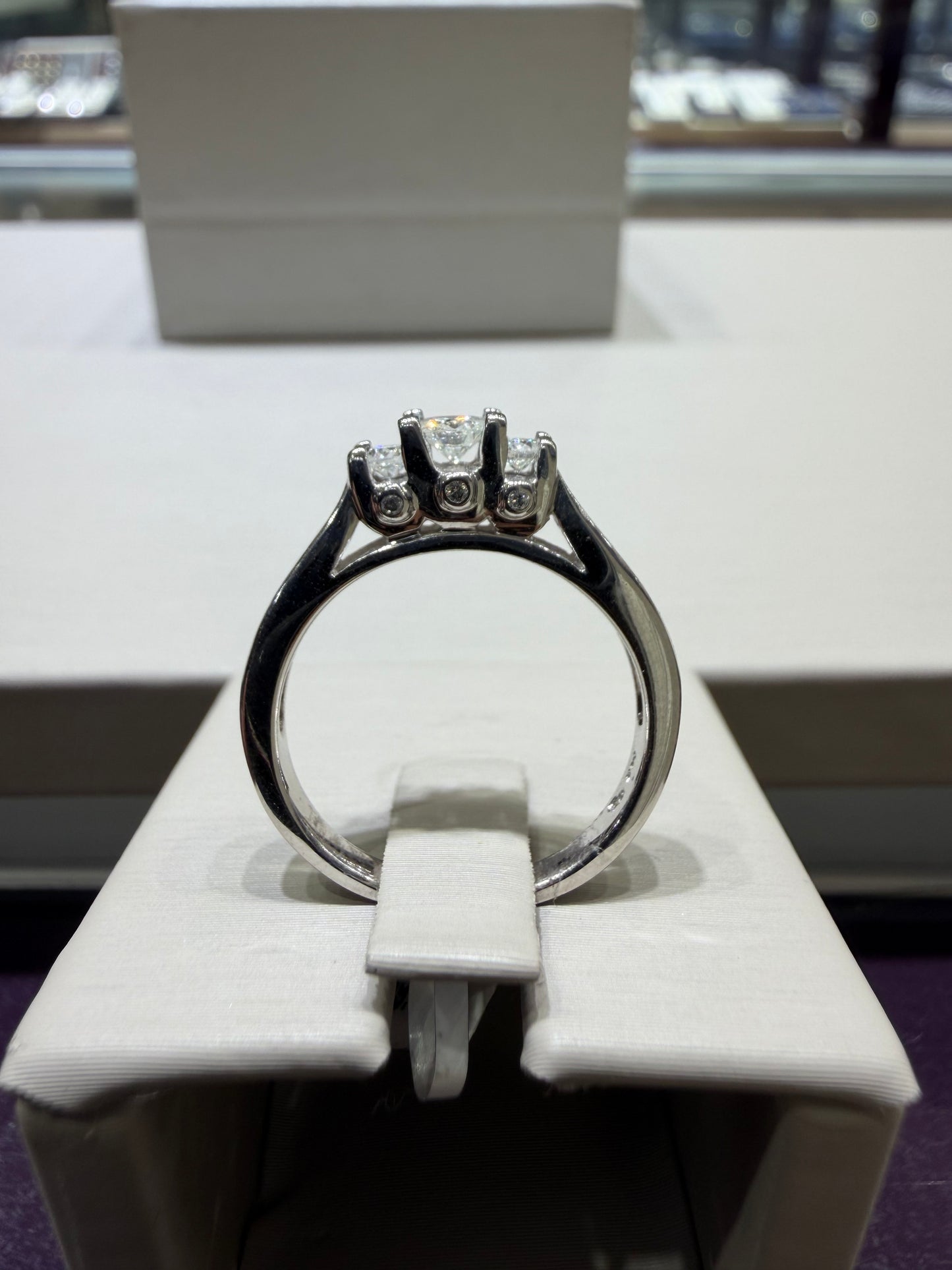 14K White Gold Three-Stone Diamond Engagement Ring with Peekaboo Diamonds – 0.75 CTW