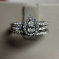 Romantic 14K white gold pear halo wedding set with .25ct center and 1ct total diamonds. Elegant sparkle and timeless beauty