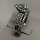 Romantic 14K white gold pear halo wedding set with .25ct center and 1ct total diamonds. Elegant sparkle and timeless beauty