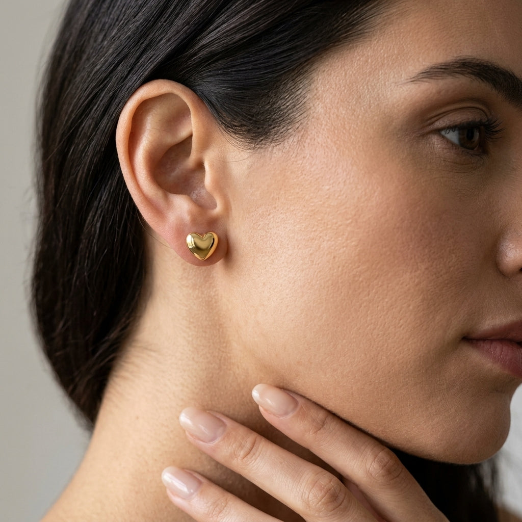 Gabriel & Co. 14K Yellow Gold Puff Heart Stud Earrings - worn lifestyle photo