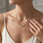 Gabriel & Co. 14K Yellow Gold Crescent Moon Diamond Pendant Necklace .12CTW - worn lifestyle photo
