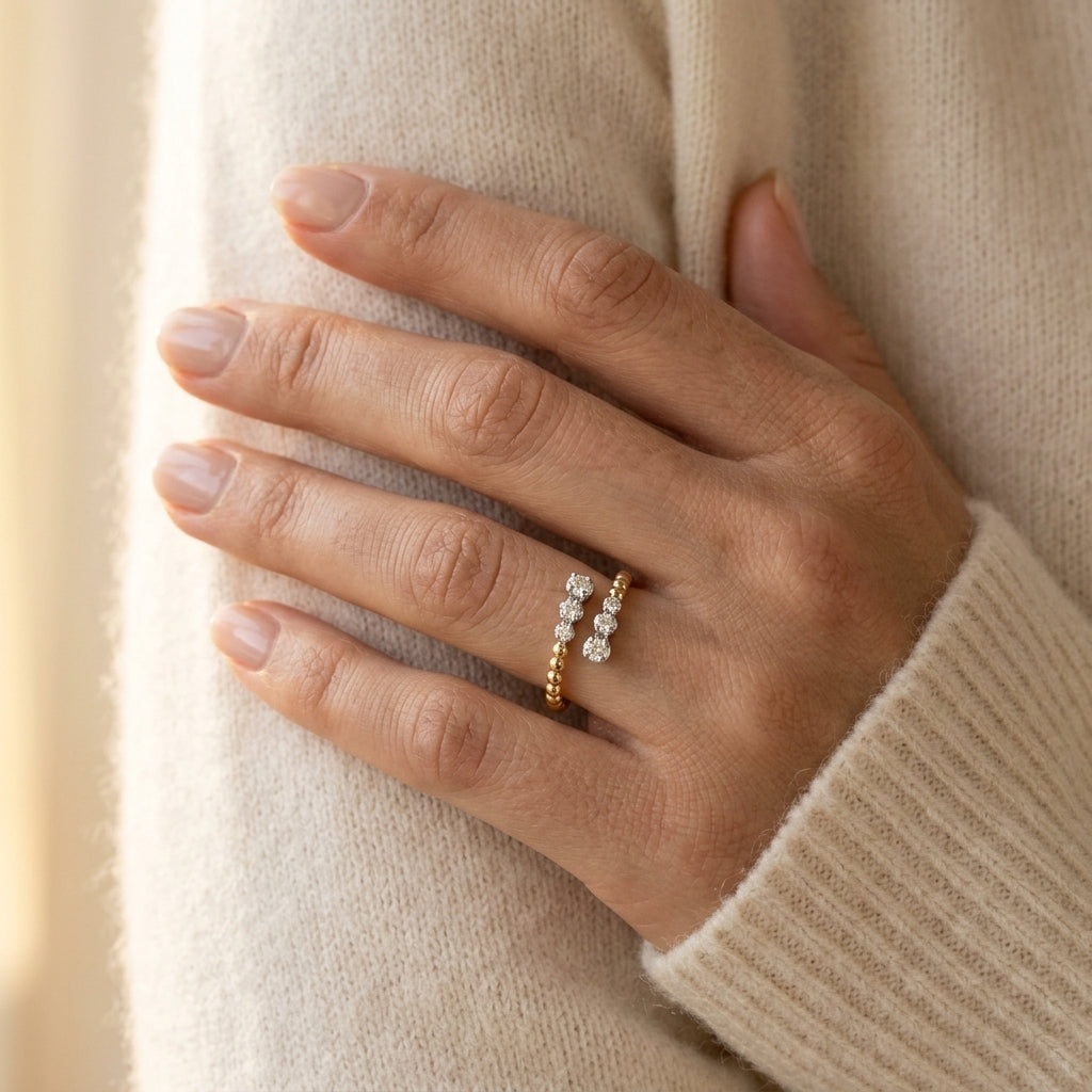 Gabriel & Co. 14K White-Yellow Gold Bujukan Ball and Diamond Open Bypass Ring .14ctw - worn lifestyle photo